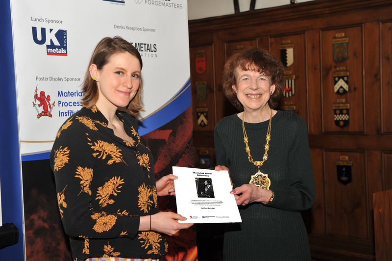 Amber Keegan (left), thecurrent Ashok Kumar Fellow, receives her certificate from Nicola Davies of The Armourers & Brasiers Gauntlet Trust at the fifth Postgraduate Research Symposium on Ferrous Metallurgy organised by the Material Processing Institute