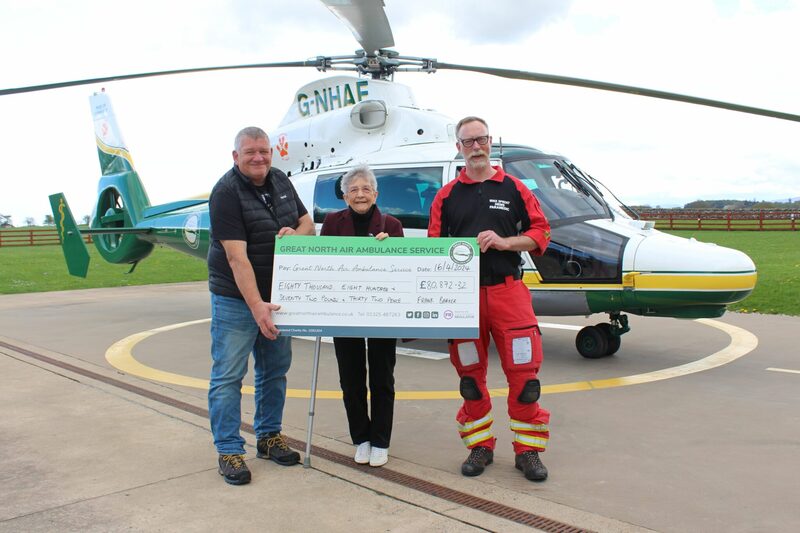 Bryan and Sally Ingall with the GNAAS paramedic Mike Sproat with the cheque 2 scaled