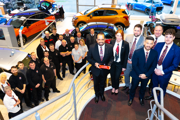 Jass Singh, general manager (holding award) with the team at Sunderland Vauxhall