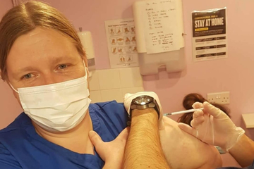 Senior Carer Heather Burgess getting her vaccination