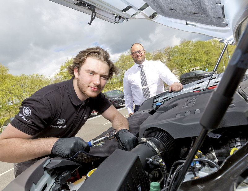 Apprentice Adam Johnston with Domanic Fraternale service manager at Farnell Land Rover 