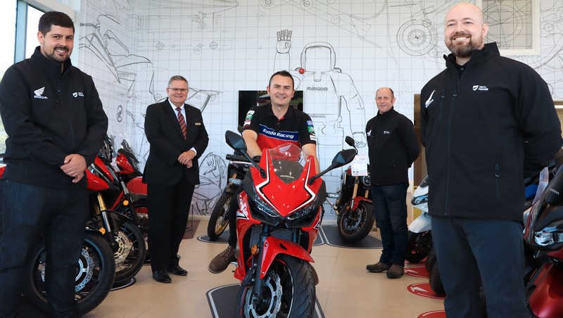 Mark Goode (centre), Vertu Motorcycles Brand Director, with some of the Vertu Honda Bikes Stockton team