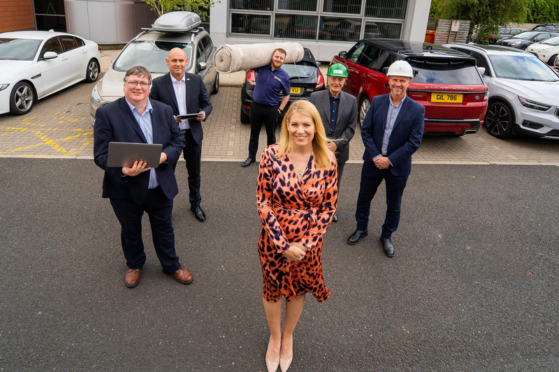 Square One Law managing partner Gill Hunter (centre) in front of the new office in Darlington with (left to right) IT consultant Ian Jackson, Justin Godfrey from Aspire Technology Solutions, Jimmy Campbell from Frank’s The Flooring Store and John Richards