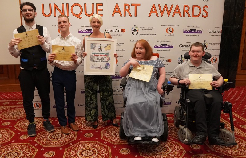 The artists receiving their awards