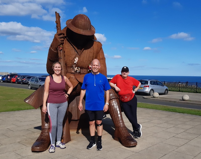 Waddington Street Centre’s finance officer Claire McGrother, Assistant manager Steve Wakefield, and centre member David Davies in Seaham for the triathlon