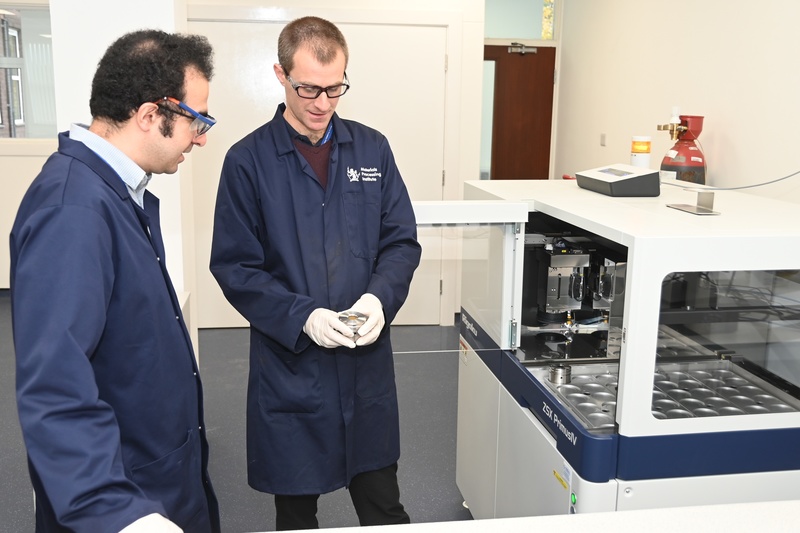 L-R: Ian Moore and Ehsan Rahimi, Senior Researchers at the Materials Processing Institute, assessing samples for XRF calibration