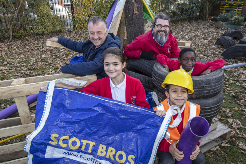 L-R: Peter Scott and Keith Smith with some of the pupils enjoying their creative playtime