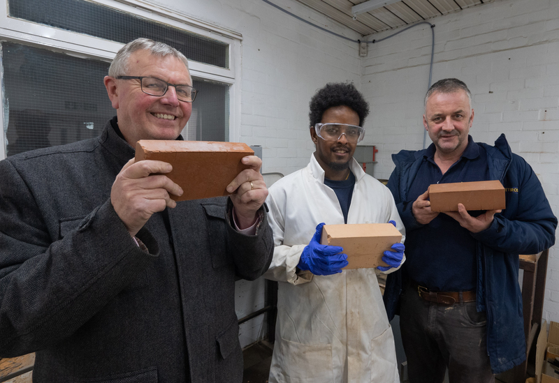 L-R: Bob Borthwick, Feysal Shifa and Peter Scott with the prototype bricks developed by Scott Bros