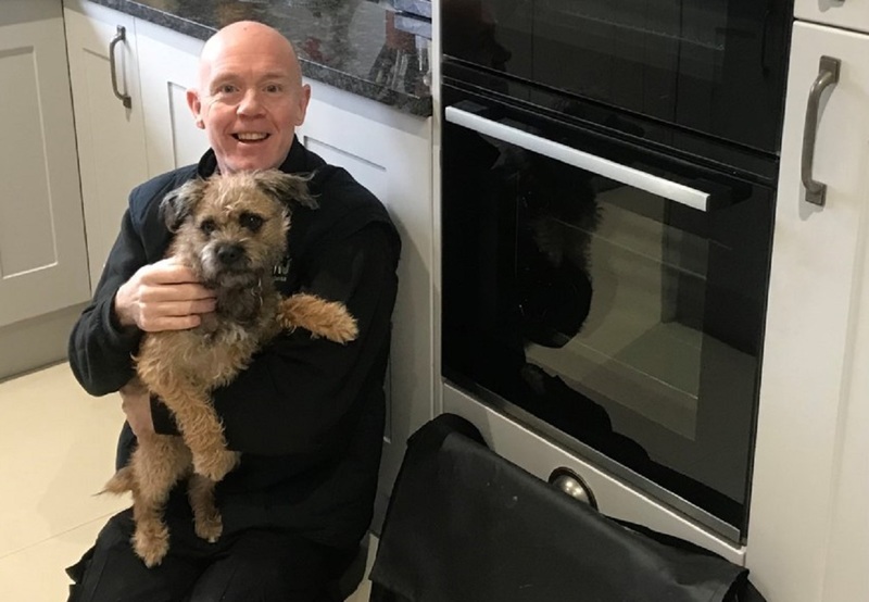 Rob Cunningham with ‘Pet of the Day’ Reggie - after restoring his owner’s oven to near showroom condition