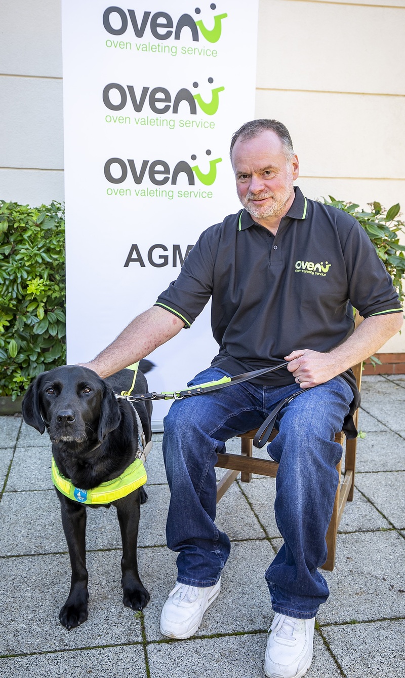 Peter Williams of Ovenu Plymouth North pictured with guide dog Yoko