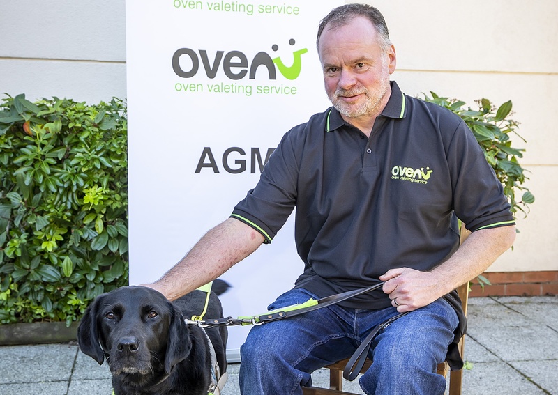 Peter Williams of Ovenu Plymouth North pictured with guide dog Yoko