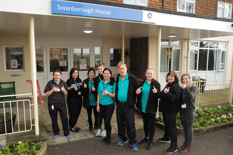 Staff at Swanborough House celebrate the positive CQC 