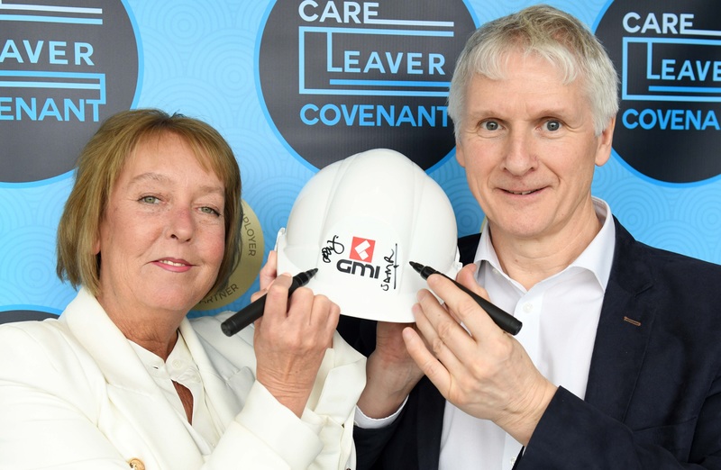 Claire Preston with Mark Rogers, chair of the Care Leaver Covenant advisory board as GMI Construction Group becomes a signatory