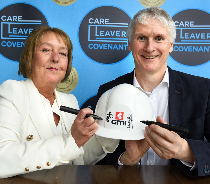 Claire Preston of GMI Construction Group pictured recently signing up to the Care Leaver Covenant with Mark Rogers from the national inclusion programme