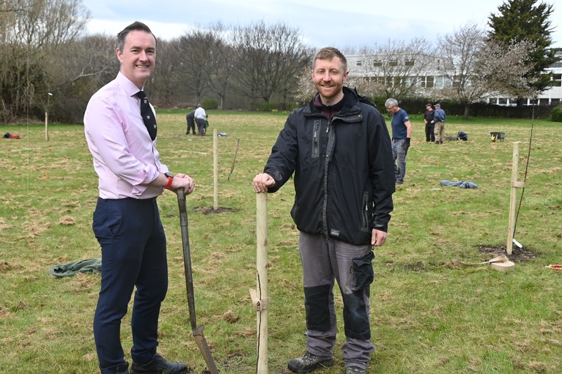 Chris McDonald (left) helps Matt Dove-Jones of Tees Valley Wildlife Trust to plant saplings in the grounds of the Materials Processing Institute