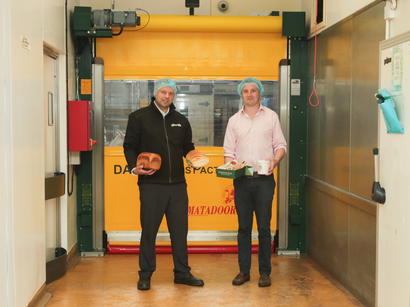 Union’s Richard Tarleton (left) and Wilfred Dorrington (right) with the latest door to be installed at the bakery
