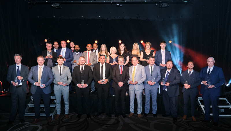 CEO Robert Forrester (front row red tie) and John Barnes (back row centre) with Masters winners at the ceremony 