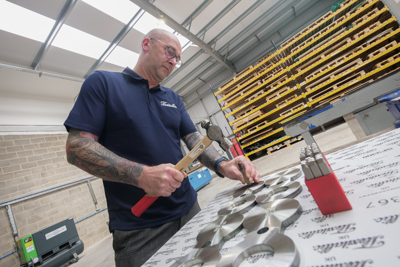 Gary Yarker stamps the size rating, grade, and cast number on a spectacle plate at Flexitallic UK’s North East Service Centre