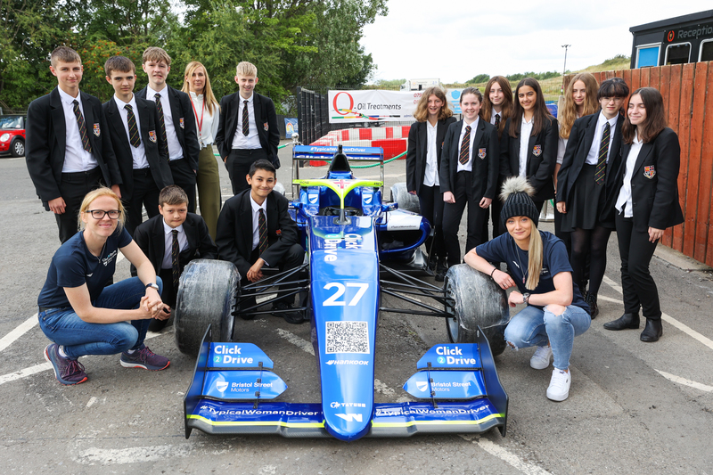 Click2Drive Bristol Street Motors drivers Alice Powell and Jessica Hawkins with the pupils