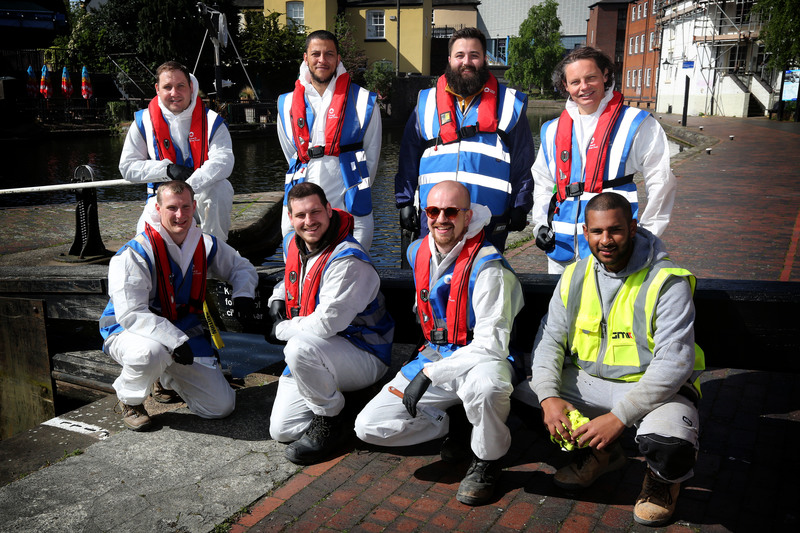 Members of GMI Construction Group’s Birmingham-based team restoring the locks at Cambrian Wharf