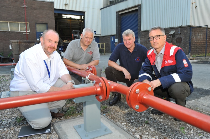  L-R: Bob James, the Institute’s Hydrogen Collaboration Lead, Chris Nightingale, Director of Maple Controls, Nigel Riley of CMS UK Ltd, and Mark Allen, the Institute’s Group Manager, Industrial Decarbonisation, with a section of the hydrogen pipework