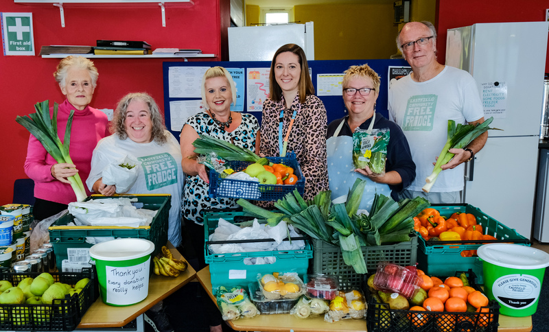 Laura Young from Beyond Housing (centre) with the team from Eastfield Community Free  Fridge 