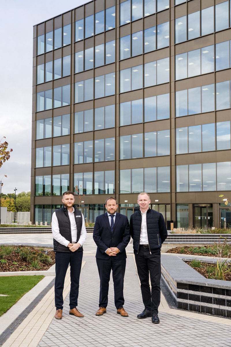 L-R: GMI Construction Group's Assistant Quantity Surveyor Ryan Smith, Construction Director Martin Watson, and Quantity Surveyor Callum Hepples pictured following the practical completion of the B3 office building at Thorpe Park Leeds