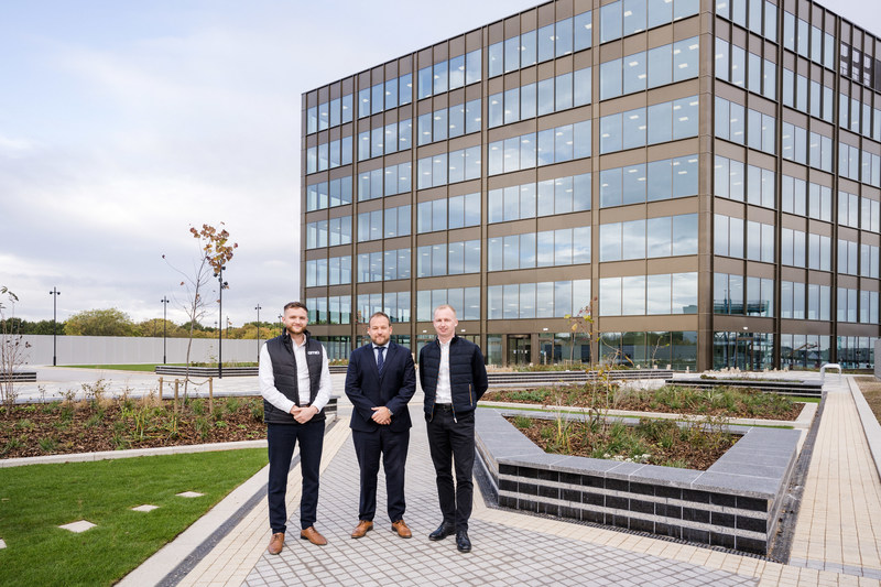 L-R: GMI Construction Group's Assistant Quantity Surveyor Ryan Smith, Construction Director Martin Watson, and Quantity Surveyor Callum Hepples pictured following the practical completion of the B3 office building at Thorpe Park Leeds