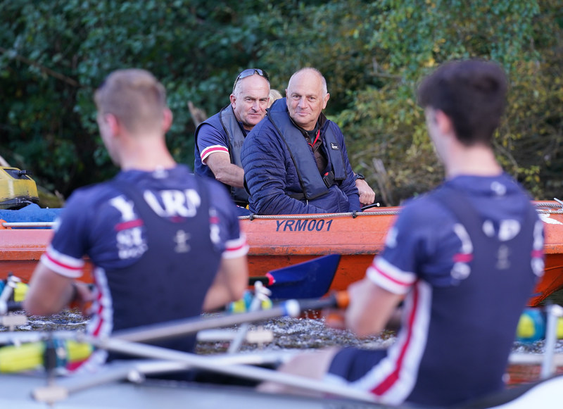 Sir Steve Redgrave coaching rowers on the river (photo credit Terry Blackburn) 