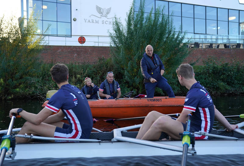 Sir Steve Redgrave coaching rowers on the river (photo credit Terry Blackburn) 
