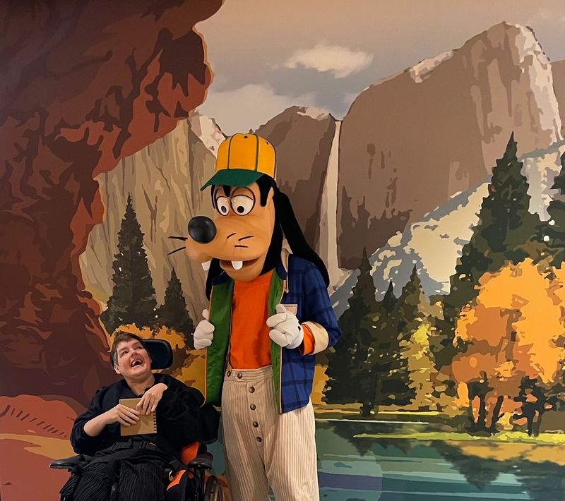 Debbie with Goofy the Disney character 