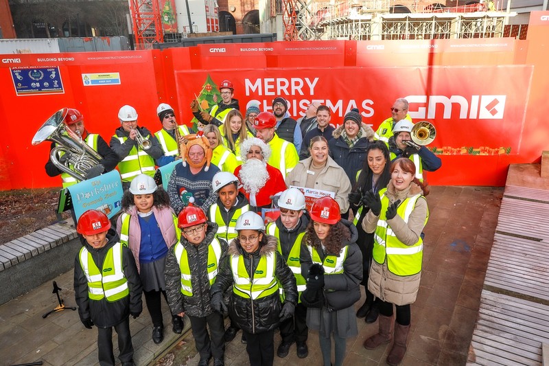 Pupils from Little London Community Primary School, GMI Construction staff, representatives from Martin House Children’s Hospice and the Yorkshire Oompah Band perform the official switch on of the Sovereign Square Christmas lights.