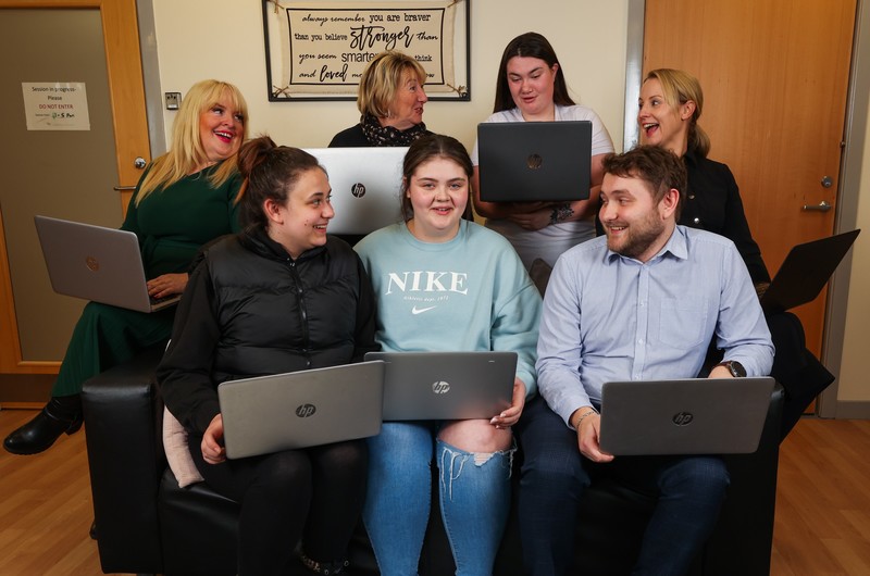 GMI Construction Group donates 10 refurbished laptops during a visit to Durham County Council’s Care Leavers Service at Sherburn Hill Care Leavers Hub, Durham. Pictured are: Pam Green, GMI’s Responsible Business Partner, Lally Walsh, Trish Lambert, of the