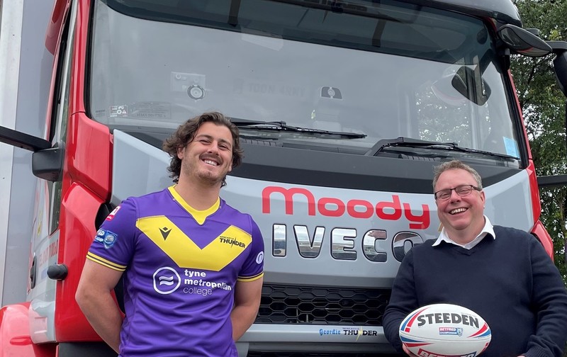 Newcastle Thunder’s Craig Mullen with Moody’s operations director Richard Moody and Moody’s ‘Geordie Thunder’ truck named in the club’s honour