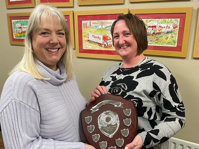 L-R: Caroline Moody presents Andrea Raynard with the Employee of the Year trophy