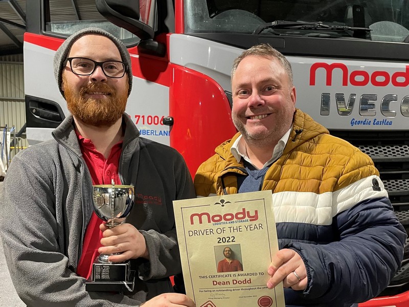 L-R: Dean Dodd receives his Driver of the Year trophy from operations director Richard Moody