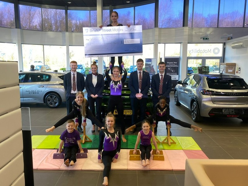 Members of Grindon Gymnastics Club with dealership colleagues 