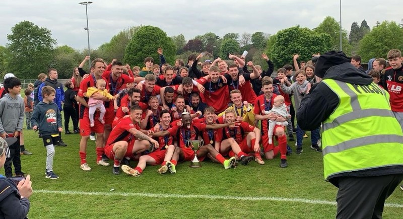 Winchester City celebrating promotion at the end of last season