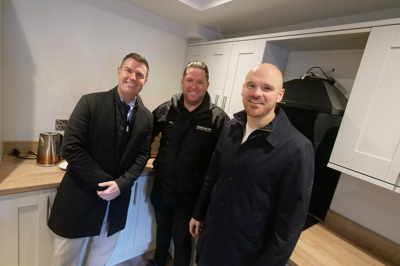 Developers Ben Quaintrell and Olly Lawson with Stephen Nicholson (centre) in a high-spec communal kitchen