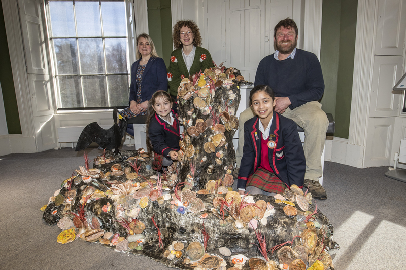 Pupils pictured with the art installation on display in Preston Park Museum