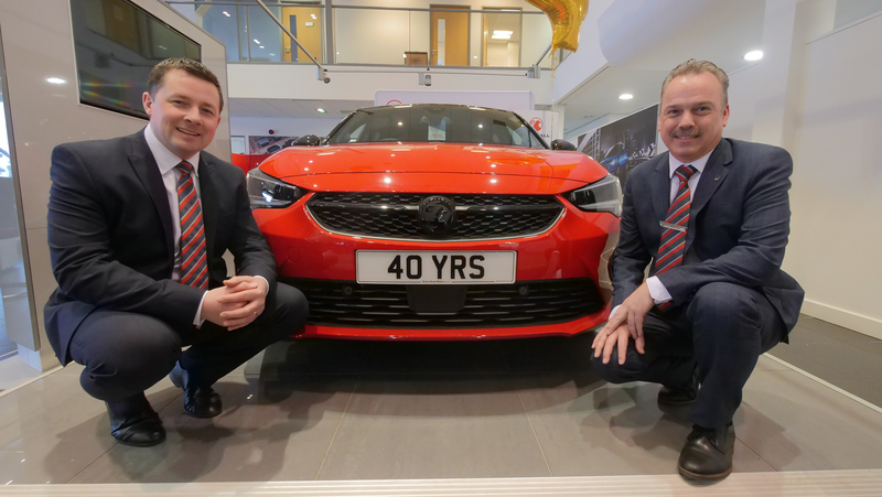 Liam Fenwick, General Manager at Bristol Street Motors Newcastle Vauxhall, with Gavin Gray who is celebrating 40 years with the site
