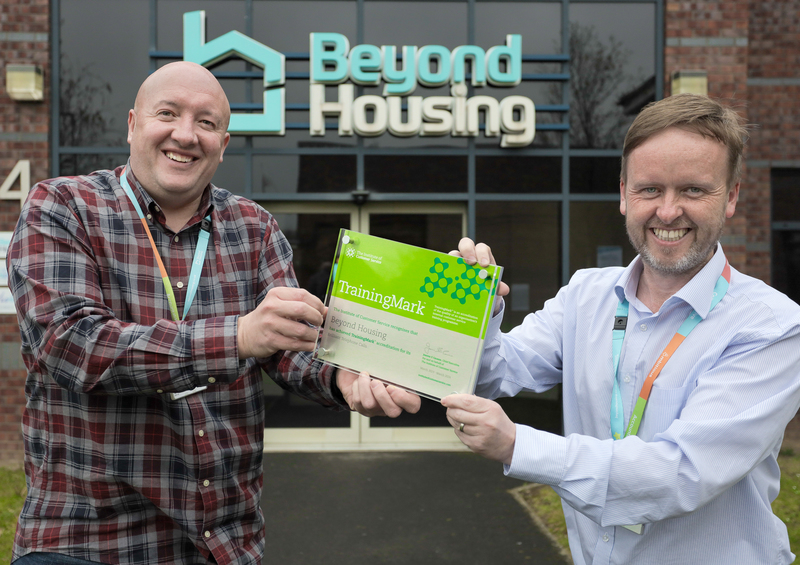 Beyond Housing Customer Service Trainer Jonathon Brady with Director of Customer Services Chris Roberts