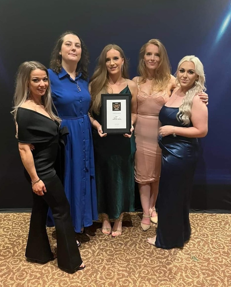 l-r Jade Manson, Sarah Gibson, Gemma McGregor, club sales manager Emma McGregor and Jade Purves with the award 