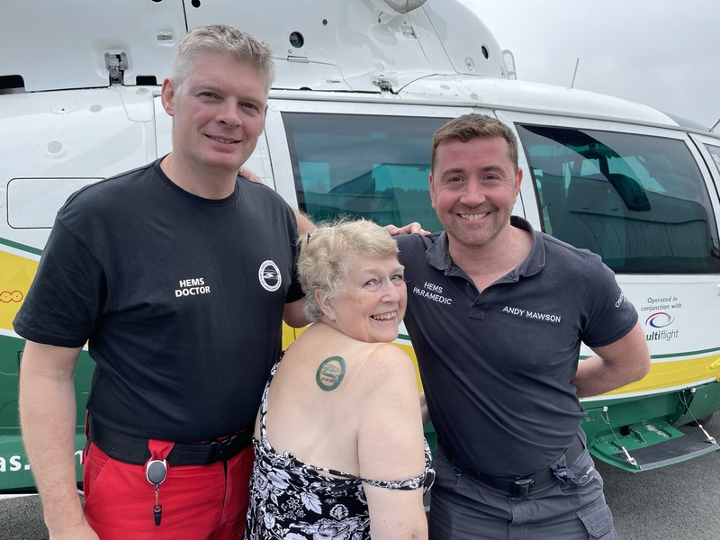 Sue Wilkinson with paramedic Andy Mawson and Dr Phil Godfrey 