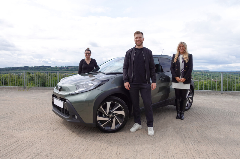Charity Escapes' Carly Sells and Jordan Proctor with Beth Aynsley from Vertu Motors