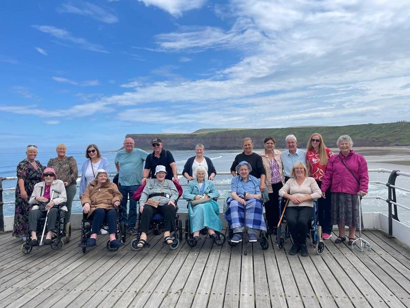 Astune Rise residents and colleagues on Saltburn Pier