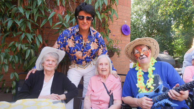 (L-R) Residents Mavis and Monica with Elvis and Activities Coordinator Jenny
