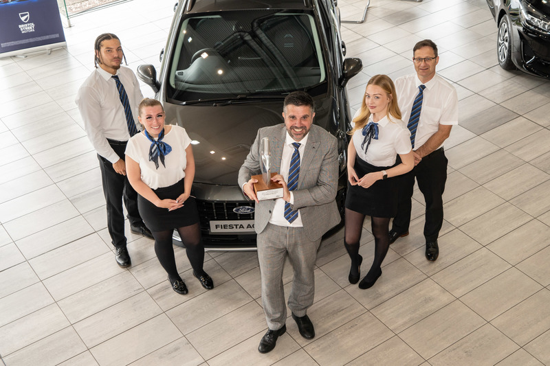 Front - David Howe, General Manager of Bristol Street Motors Kings Norton Ford with colleagues 