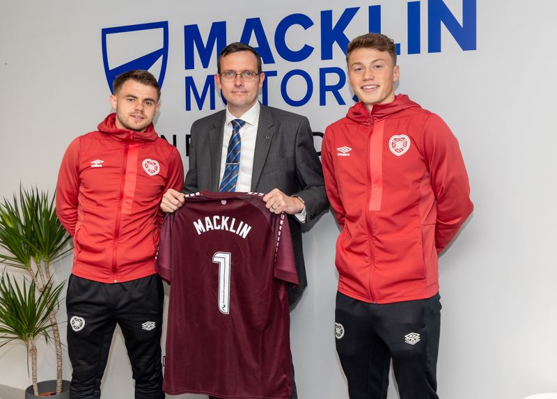 Mark Littlejohn, General Manager of Macklin Motors Edinburgh, was presented with a shirt by Hearts players Alan Forrest and Aidan Denholm, to celebrate the partnership with Heart of Midlothian Football Club.