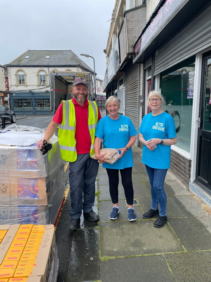 Lee Roden of Moody Logistics delivers the donations of breakfast cereals and toiletries to Blyth Foodbank volunteers Wendy Hogg and Maureen Kelly